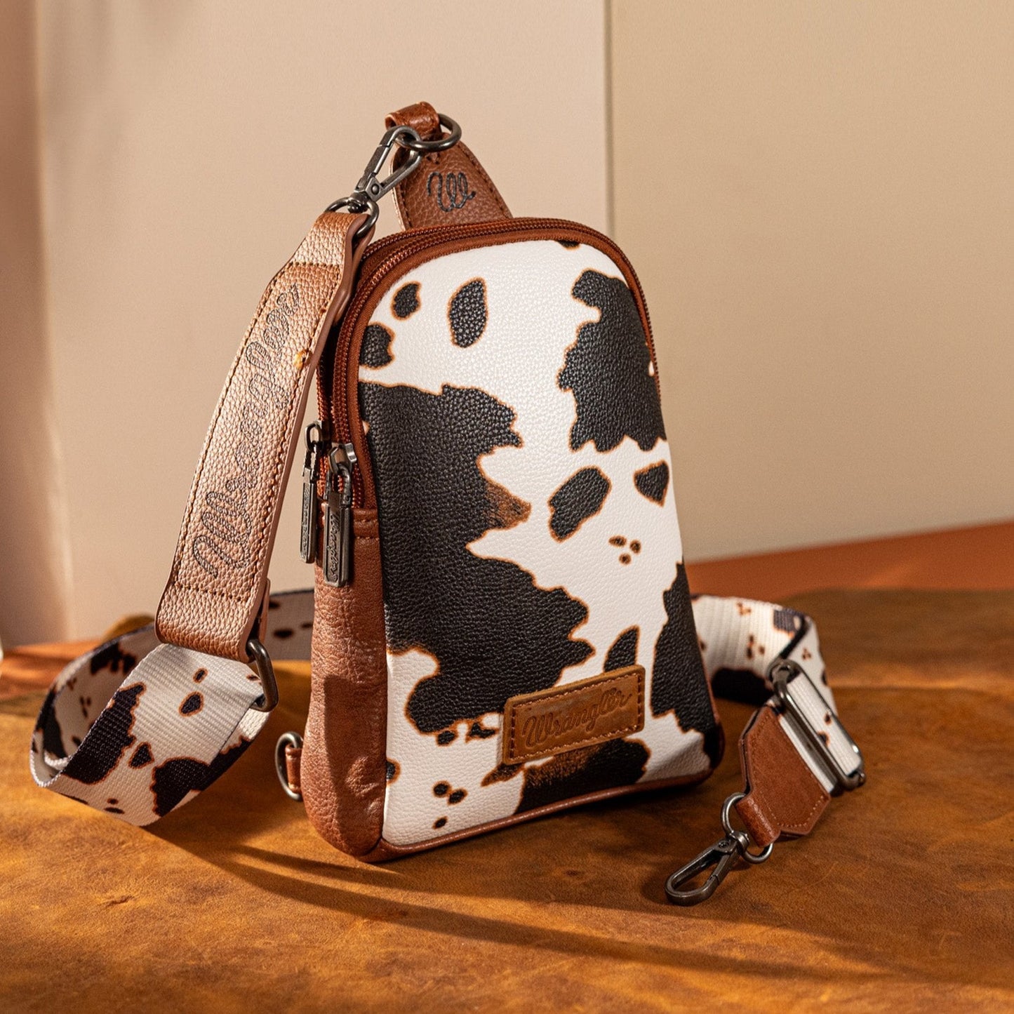 WRANGLER COW PRINT SLING BAG