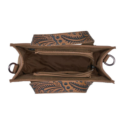 Top-down view of a brown leather shoulder bag with an intricate blue and tan floral tooled pattern on the exterior and a brown fabric lining inside, shown on a plain white background.