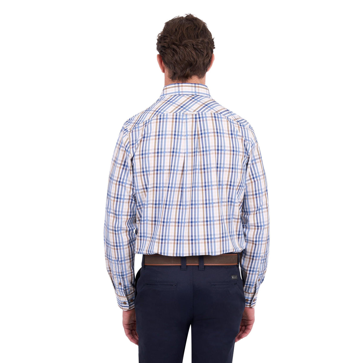 A man viewed from the back wearing a long-sleeve plaid button-down shirt with blue, white, and beige stripes, paired with dark navy trousers and a brown belt, against a plain white background.