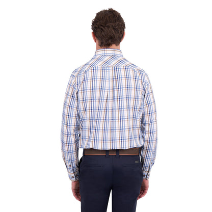 A man viewed from the back wearing a long-sleeve plaid button-down shirt with blue, white, and beige stripes, paired with dark navy trousers and a brown belt, against a plain white background.