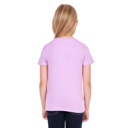 A young girl with blonde hair, viewed from behind, wearing a light purple short-sleeve t-shirt and dark blue jeans against a white background.