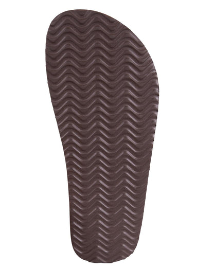 A dark brown shoe sole with a wavy chevron tread pattern, shown against a plain white background.